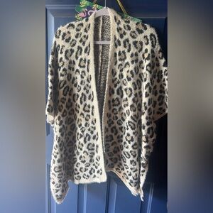 Ladies shrug with hair like texture.